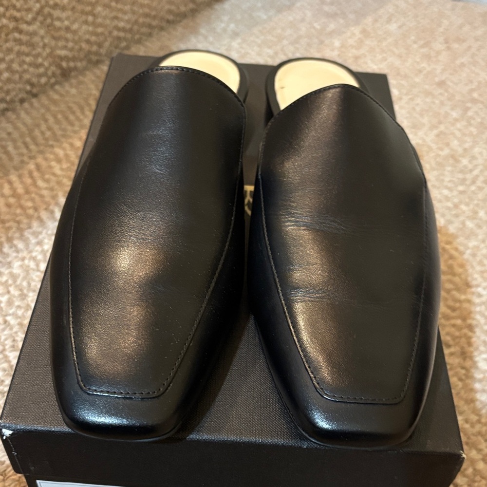 Black Leather women’s Slip-On Shoes brand new never worn.